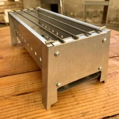 Spiedini Saté-bbq Bali 40 Mini - Kleine, Smalle Houtskoolbarbecue Met Horizontaal Rooster Voor Sate Of Andere Spiesjes - 40 Cm Lang, 11 Cm Breed, 14 Cm Hoog - Ideaal Voor Tuin- Of Open Haard, Of Balkon - Materiaal: Gealuminiseerd Ijzer -Barbecue Verkoop 1200x1200 705